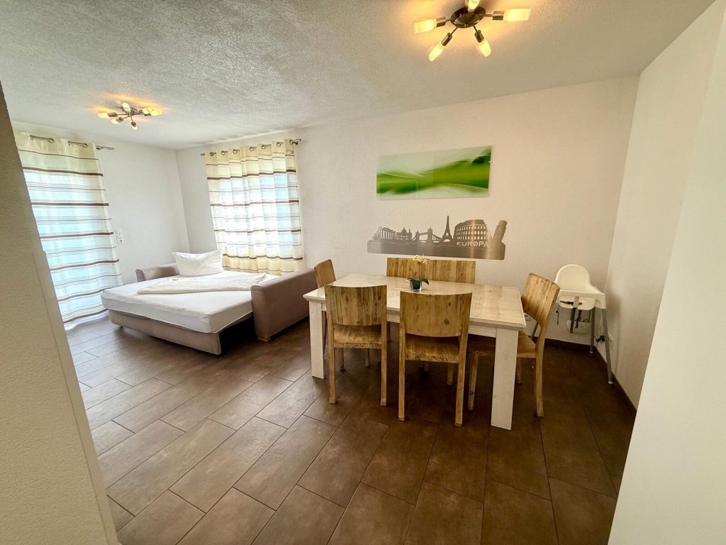 Living and dining area in the lower apartment
